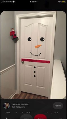 an image of a door decorated like a snowman