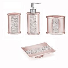 the bathroom accessories is pink and has silver glitters on it, along with a soap dispenser