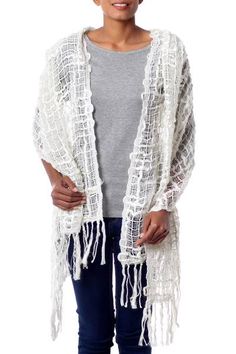 From Sandeep Malhotra this novel shawl is trendy and lightweight. Ivory yarns in varying thicknesses flow together in a voluptuous open weave wrap. Luxury Chikankari Pashmina Shawl For Festivals, White Shawl For Beach In Spring, White One Size Beach Scarf, White Shawl For Spring, White One-size Scarf For Spring, One-size White Shawl For Summer, White One-size Scarves For Spring, White Scarves One Size For Spring, White One Size Scarves For Spring