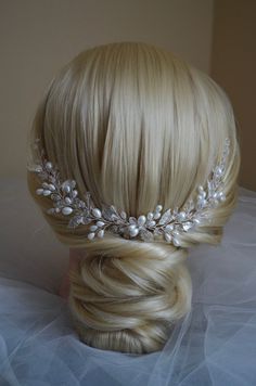 This hair comb decorated pearl beads, silver plated brass leaves, and Czech crystal beads. All parts was carefully combined to each other for making the best hair accessory for your special day. DETAILS - Put headpiece after using hair spray - Do not use any washing liquids and chemicals - Please keep your hair accessory in dry please away from direct sunlight - Tarnish resident jewelry wire - Designed and made in New York, USA - Flexible and easy to use - Every headpiece will be packaged in gif White Silver Hair, Bridal Hairpieces, Bridal Pearl Hair, Pearl Hair Comb, Pearl Hair Vine, Silver Hair Comb, Makeup Nails Designs, Pearl Hair Combs, Simple Elegant Wedding