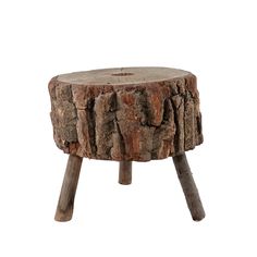 a tree stump with wooden legs on a white background for use as a coffee table or stool