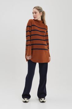 Our favorite sweater of the season, the Sarabeth is knitted in a super chic rust / navy stripe that pairs back perfectly to our Seamless legging or BFF denim. Made in our recycled fabric, this sweater has hidden zippers for easy nursing access. NOM is designed and built to last during, for nursing + after. FREE shipping and returns on all US orders CARE + DETAILSMachine wash. Lay flat to dry.33% Nylon 28% Recycled Polyester 19% Acrylic 16% PBT 4% Wool FIT + SIZE GUIDEFits true to size26.5" Nursing Sweater, Turtle Neck Long Sleeve, Nursing Hoodie, Baby Wrap Carrier, Sleep And Loungewear, Nursing Tops, Maternity Sweater, Favorite Sweater, Seamless Leggings