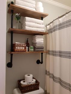 the bathroom is clean and ready to be used as a storage space for toilet paper