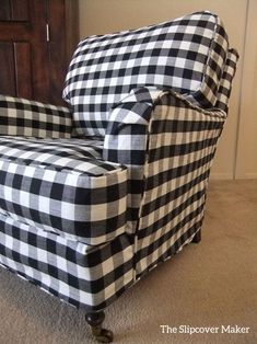 a black and white checkered chair sitting on the floor