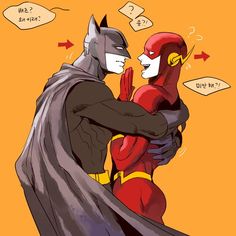 the flash and batman are hugging each other