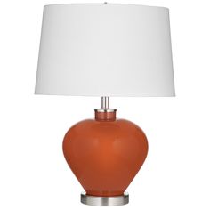 an orange table lamp with a white shade