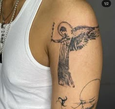 a woman with a tattoo on her arm