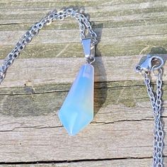 Opalite Natural Stone Hexagon Pendulum Necklace. Pendulum Measures 1 3/8” X 3/8”. Stainless Steel Chain Measures 17 3/8”. Brand New. Can Be Used For Divination On The Go! Pendulum Necklace, Hexagon Necklace, Steel Chain, Stainless Steel Chain, White Silver, Womens Jewelry Necklace, Natural Stone, Natural Stones, Opal