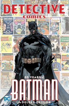 the batman comic book is being held up