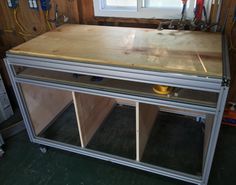 an unfinished workbench in a garage under construction