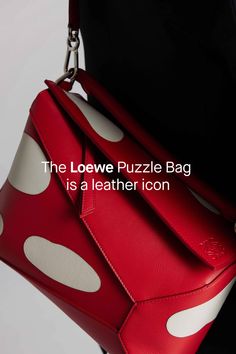 WHY THE LOEWE PUZZLE BAG IS SO UNIQUE, why Loewe sunglasses are stand-outs, and why Loewe sneakers are trending? In the realm of luxury fashion, certain items stand out not just for their aesthetic appeal but for their innovative design and the unique story they tell. Among these, the Loewe Puzzle Bag has carved out its place as a leather icon, emblematic of the brand’s dedication to craftsmanship, innovation, and artistic expression. Tap the link to shop or keep reading. Puzzle Bag Loewe Street Styles, Loewe Sneakers, Loewe Shoes, Loewe Puzzle Tote, Loewe Sunglasses, Loewe Puzzle Bag Mini, Loewe Bag Puzzle, Loewe Puzzle Shoulder Bag