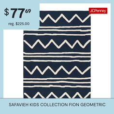 a blue and white rug with the words safavie kids collection geometric on it