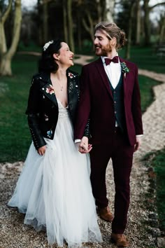 Groom in Burgundy Wedding Suit and Bride in Leather Jacket for Winter Wedding Black And Burgundy Suit, Groom In Burgundy, Burgundy Wedding Suit, Burgundy Suit Wedding, Bridal Leather Jacket, Winter Wedding Burgundy, Alternative Groom, Outdoor Pub