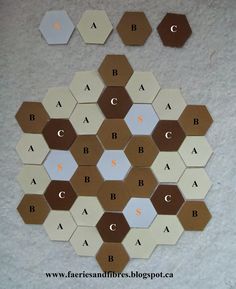 an array of hexagonal tiles with letters on them