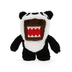 a small stuffed animal with big teeth and fangs on it's face, sitting in front of a white background