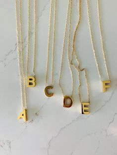 Medium Sized BOLD Initial Necklace | Bold Letter Necklace | Initial Necklace | Alphabet Necklace | Stainless Steel | Stainless Steel InitialHANDMADE-STAINLESS STEEL MEDIUM BOLD LETTER NECKLACE ⁙ Materials: Stainless Steel⁙ Available Colors: Gold & Silver ⁙ Necklace Length: 15"-17.25'' in the length of your choice, chain measures 1.5 mm in width. Anything above 17" will include an extender - Please request your desired size on the notes section. Otherwise a 17.5" with 2" extender will be sent ⁙ P Letter Necklace Initials, Gold Silver Necklace, Alphabet Necklace, Mom Outfit, Necklace Initial, Name Necklaces, Letter Necklace, Initial Necklace, Jewelry Trends