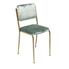 a green velvet chair with gold legs and a metal frame on an isolated white background