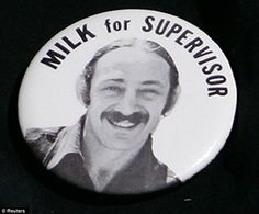 a button that says milk for supervisor with a man's face in the center