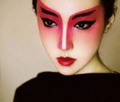 A female Japanese actor in kabuki makeup titling it “geisha drag”. The photo was uploaded to ‘addicted to pretty.con”, . This photo was published February 14, 2012l. Bjd Face, Editorial Make-up, Geisha Makeup, Chinese Makeup, Bright Makeup, Avant Garde Makeup, Lipstick Art