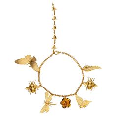 Have nature bring you its healing, calming powers with this twist on a charm bracelet. Instead of on your wrist, let the butterfly, dragonfly, and bee fly and circle your neck in love and protection. Goes perfect with the matching rings and headband. 24k gold Plated on Brass. Made in USA. Additional Information: Material: 24K Gold, Brass Dimensions: Length ( Adjustable) Bee Fly, Butterfly Dragonfly, Charming Garden, Matching Rings, Gold Brass, Secret Garden, Chains Necklace, Charm Necklace, Gold Plate