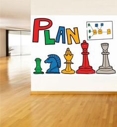 a room with wooden floors and a large wall mural depicting the word plan on it