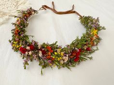 Using a range of natural dried and preserved real flowers and greenery this flower crown is truly a bliss. The first 2 photos showing our vines are blooming with little lilac flowering this only happens around Aug- September every year. Order during these times to receive this seasonal beauty before it's gone. Did you know this flower crown will last a few years if stored well? No water required, simply keep them in a cool room with good airflow and without direct sunlight. We hand make each one Woodland Flower Crown, Real Flower Crown, Flower Crowns Wedding, Dried Flower Crown, Wedding Flower Crown, Wildflower Crown, Heather Flower, Bridal Floral Crown, Boho Flower Crown