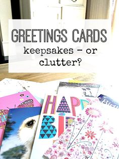 several greeting cards with the words, greeting cards keeps - or clutter?