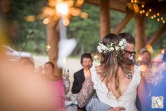 a bride and groom sharing their first dance