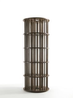 a tall metal tower with four shelves on each side and one shelf in the middle