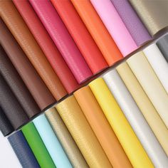 many different colors of paper are lined up