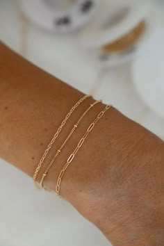 Dainty 14k Gold Bracelet With Extender, Everyday 14k Gold Delicate Chain Bracelet, Minimalist Stackable Bracelets For Friendship, Minimalist Stackable Bracelets For Everyday, 14k Gold Filled Satellite Chain Bracelet As Gift, Minimalist Hypoallergenic 14k Gold Filled Bracelets, Minimalist Hypoallergenic 14k Gold-filled Bracelets, Adjustable 14k Gold Filled Bracelets With Satellite Chain, Everyday Hypoallergenic 14k Gold Chain Bracelet