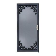 a black door with an intricate design on the glass and metal frame, in front of a white background