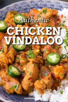 the cover of authentic chicken vindaloo is shown on a plate with rice and cucumbers