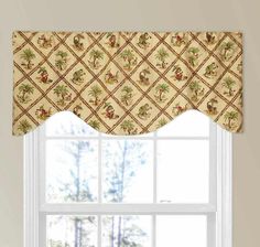 the window valance is decorated with tropical designs