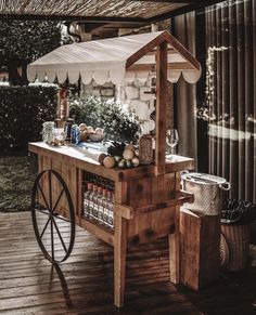 an outdoor food cart on a wooden deck