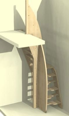 an architectural model of a spiral staircase in a room with white walls and flooring