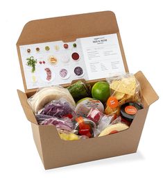 an open cardboard box filled with assorted foods