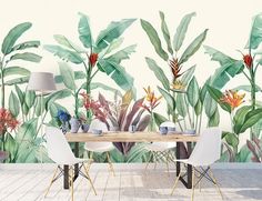 a dining room table with chairs and a wall mural in the background that has tropical plants on it