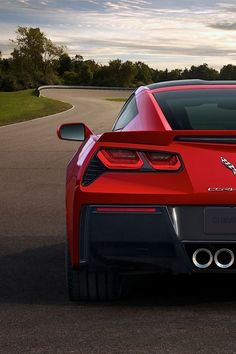 the rear end of a red sports car