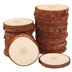 several pieces of wood stacked on top of each other in front of a white background