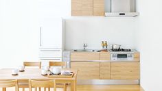 the kitchen is clean and ready to be used for breakfast or dinner time, as well as other things that are on the table