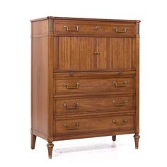 an old wooden dresser with drawers and knobs on the front, against a white background