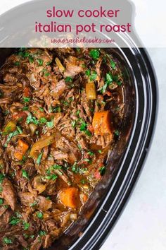 slow cooker italian pot roast with carrots and parsley in the crockpot