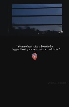 a window with the words, your mother's voice at home is the biggest blessing you