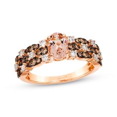 This tempting Le Vian® ring from the Venetian Mosaic Collection™ is a colorful confection. Crafted in 14K Strawberry Gold® A sweet oval-cut Peach Morganite™ centers the band Duos of rich Chocolate Diamonds® in marquise-shaped settings alternate with single Nude Diamonds™ along the band The diamonds are offset across three rows to create a stunning pattern Total diamond weight is 5/8 carat Le Vian®. Discover the Legend. This ring is available in limited sizes; if you don't see your size here, ple Engagement Ring Kay Jewelers, Chocolate Diamond Ring Engagement, Kay Jewelers Engagement Rings, Levian Rings, Peach Morganite, Chocolate Diamonds, The Venetian, Le Vian, Sapphire Engagement Ring Blue