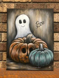 an acrylic painting of a ghost and two pumpkins