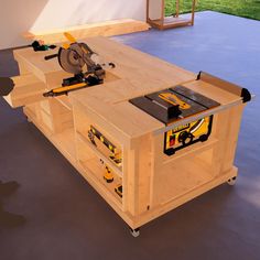 a workbench with tools on it in the middle of a room