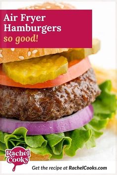 a hamburger with lettuce, tomato and pickles on it that says air fryer hamburgers so good get the recipe at rachel cooks