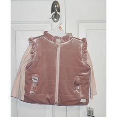 This Pink Velvet Vest Adds Warmth And Texture For Baby Girl. Vest: * Stand Collar * Sleeveless * Ruffle Trim * Faux Fur Lined * Zip Closure * Front Pockets With Bow Detail * 100% Polyester * Machine Wash, Tumble Dry Top: * Lace Trim Neckline * Button Back Closure * Long Sleeve * Bottom White Logo * 60% Cotton, 40% Polyester * Machine Wash, Tumble Dry Baby Vest Vinyl, Velvet Vest, Vest Set, T Shirt Picture, Pink Velvet, Baby & Toddler Clothing, Pink Shirt, Girls Long Sleeve