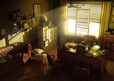 an old fashioned desk and chair in a room with sunlight coming through the window onto the floor